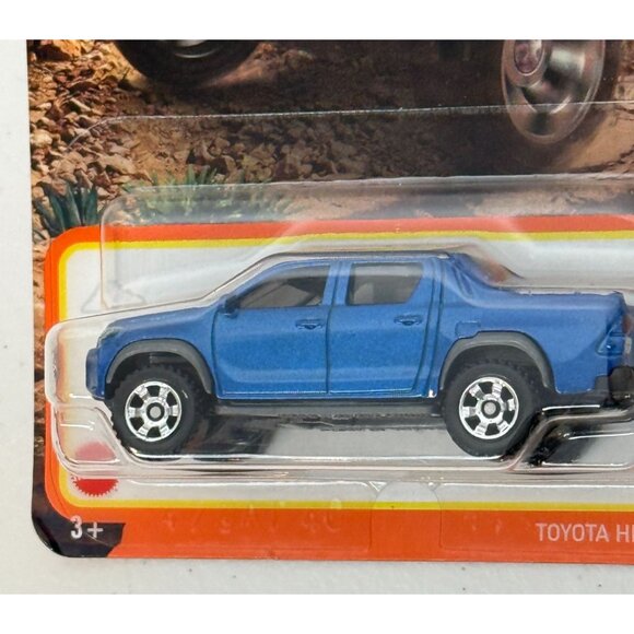 Matchbox Toyota Hilux Pickup Blue Off-Road Truck 35/100 Metal Body 2024 - Picture 3 of 4